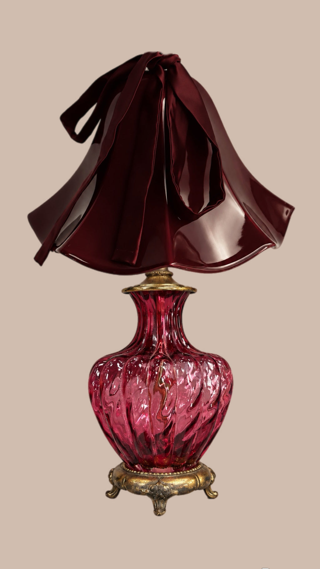 Pilgrim Cranberry glass lamp 10.5” tall by 5” wide - patina brass